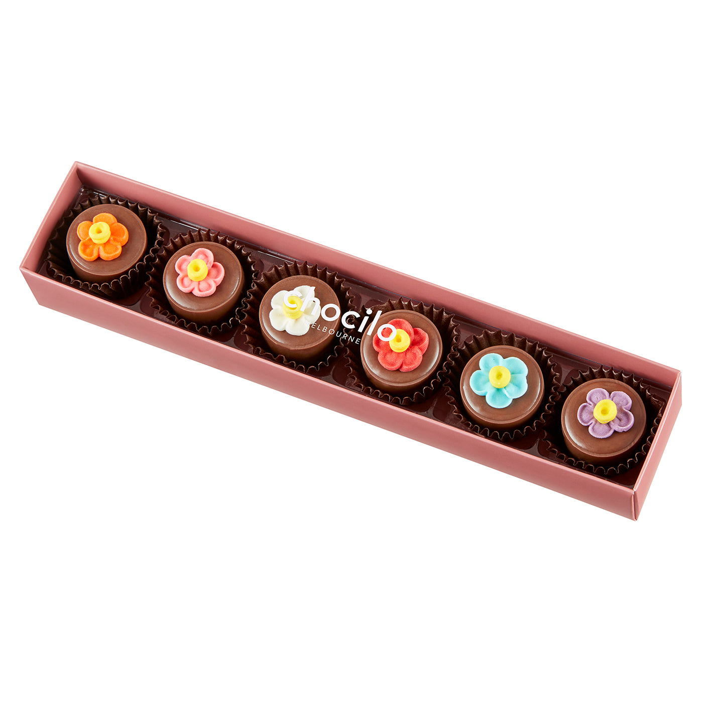 A pink gift box containing six milk chocolate pralines topped with handcrafted candy flowers.